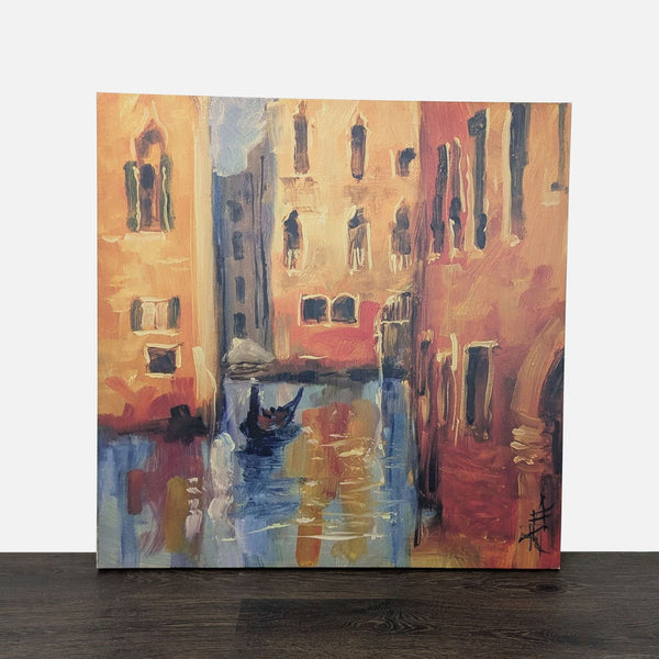 Impressionistic canvas art of a canal with ochre buildings, water reflections, and a gondola by Winston Porter.  