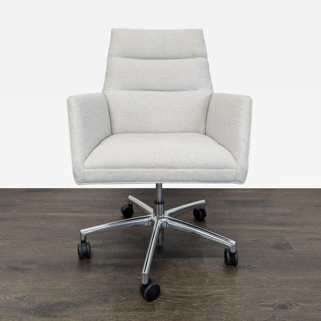Modern Room & Board office chair in light gray upholstery with armrests and chrome caster base.  