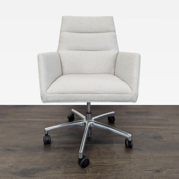 Modern Room & Board office chair in light gray upholstery with armrests and chrome caster base.  
