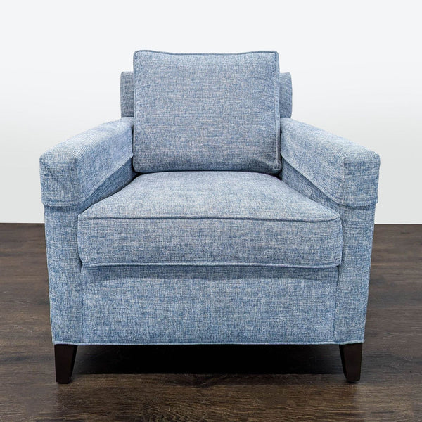 1. Ethan Allen lounge chair with plush cushions and sleek armrests, perfect for modern living spaces.