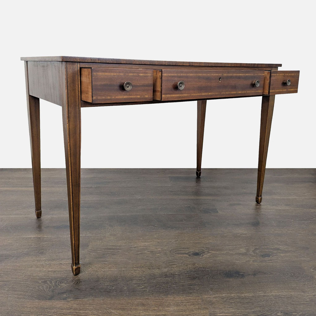Antique console table, ca. 1790, with reeded edge top, decorative inlay, and three dovetailed drawers.  