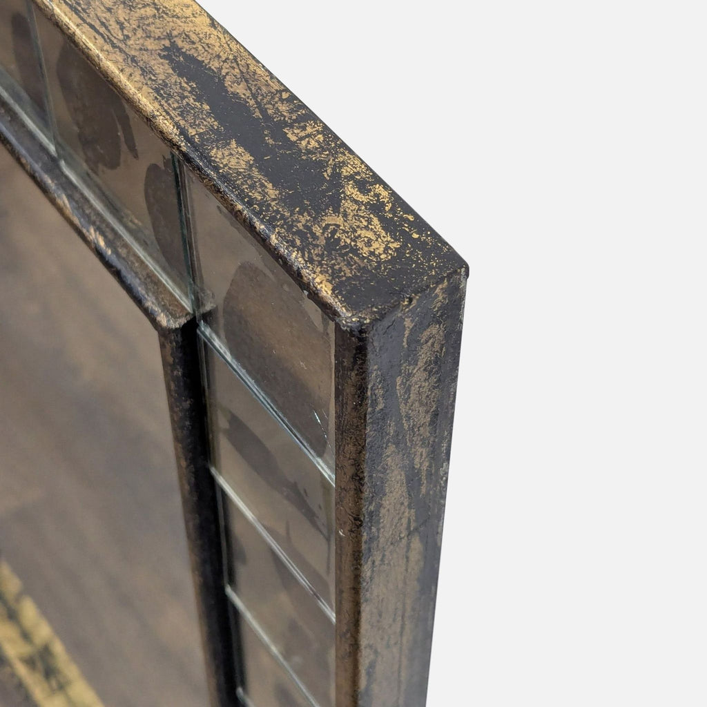 3. Angled detail of the mirror’s top edge, highlighting the distressed finish and antiqued tile border.