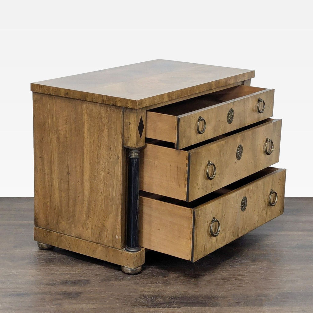 Classic wood-finish Baker dresser featuring spacious drawers, round brass pulls, and elegant metal accents.