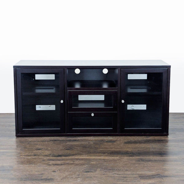 Jesper Office dark wood media console with glass doors, shelves, and cable management openings.