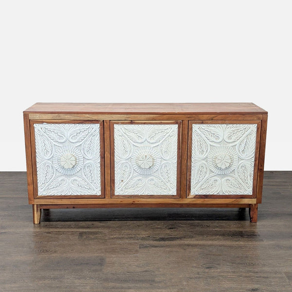 Signature Design by Ashley wood credenza with carved three-door panels and interior shelves, sideboard category.