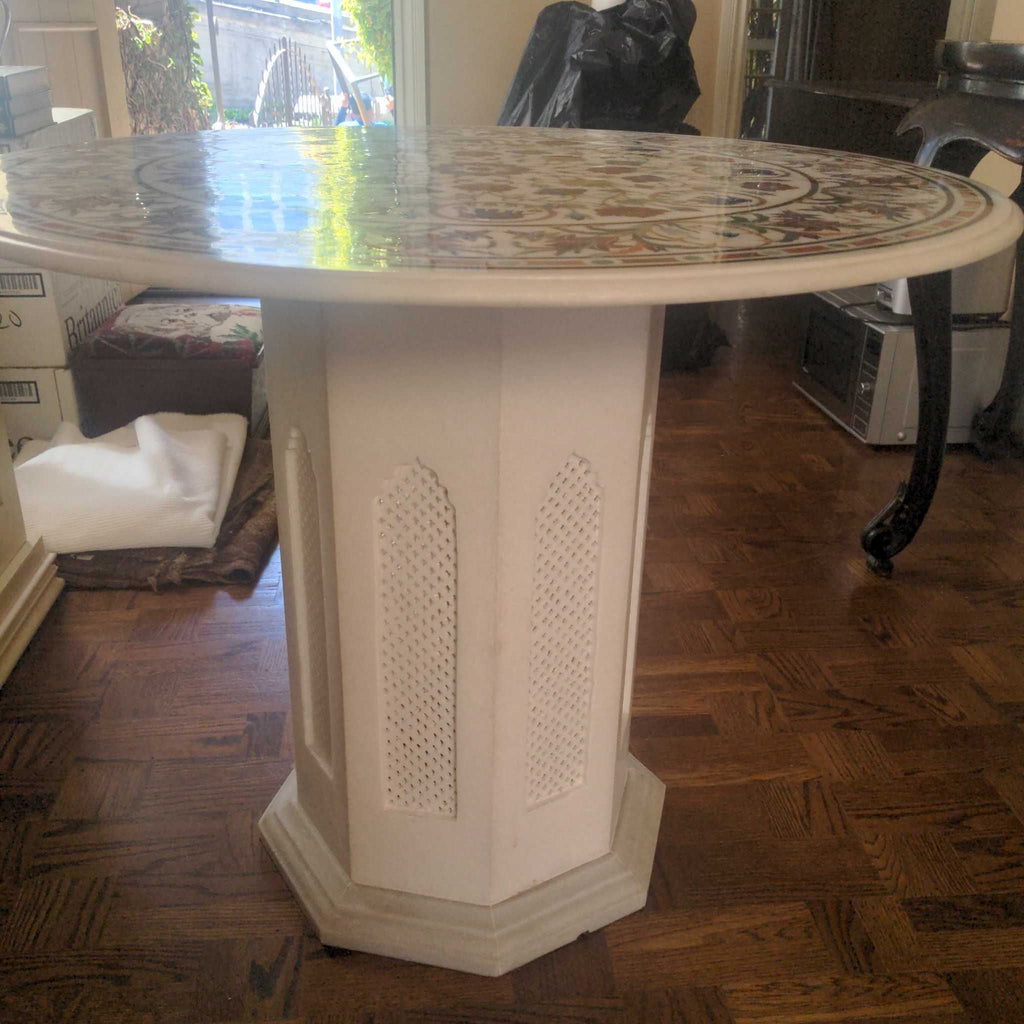 2. White console table with octagonal base and lattice detail, topped by a colorful inlaid marble surface.