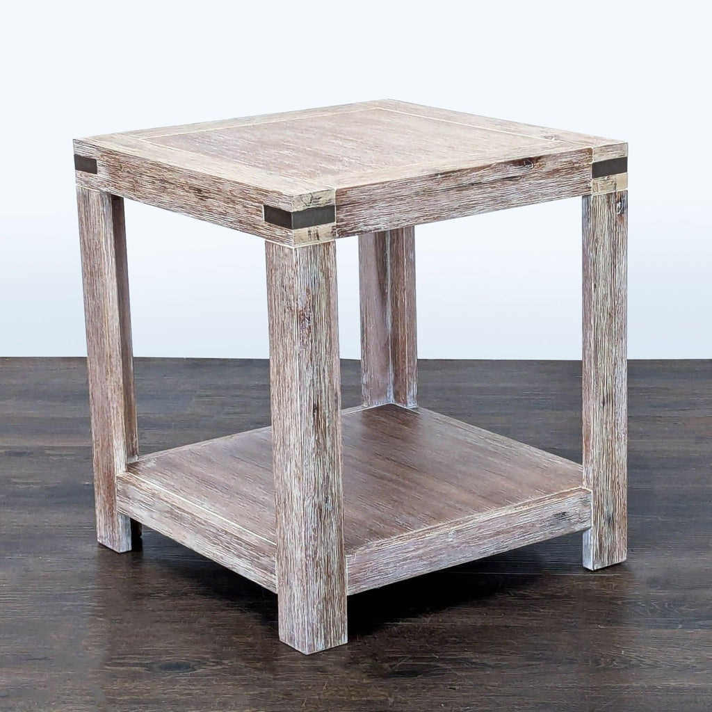 3. Contemporary end table from Terrace Living Company, ideal for living spaces, shown with decorative items.