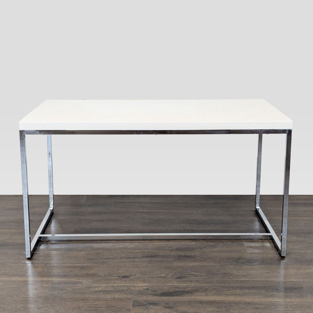 Sleek white Scandinavian Design desk with chrome legs, ideal for modern offices or home workspaces.