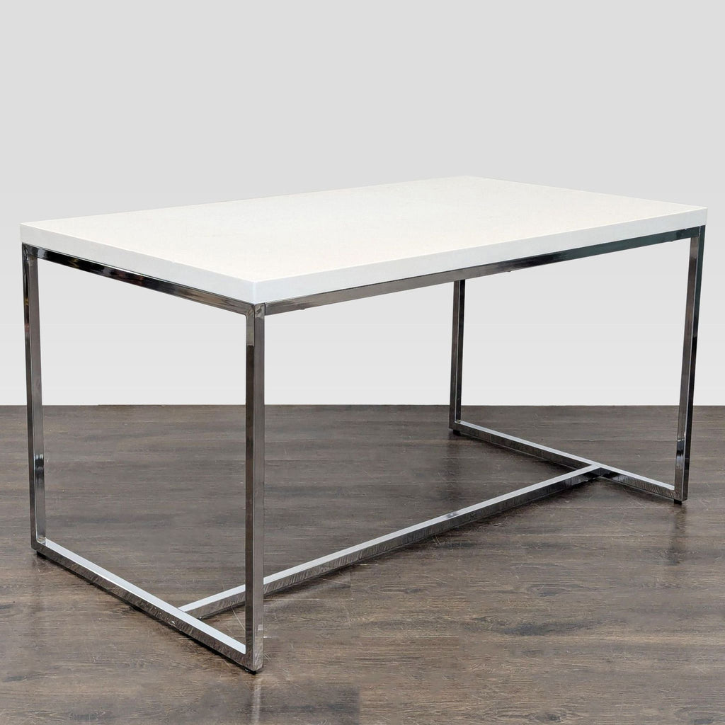 Minimalist desk by Scandinavian Design; spacious white top and chrome frame suit versatile work needs.