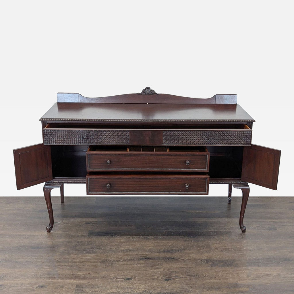 Sideboard & Credenza by Lenox featuring ornate woodwork, three drawers, and two cabinet doors.  