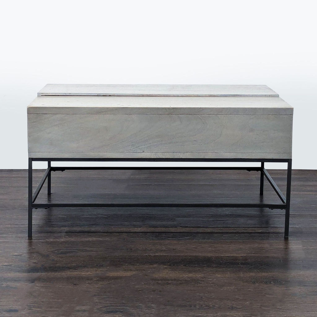 1. Modern West Elm coffee table with sleek lines, perfect for contemporary living spaces.  