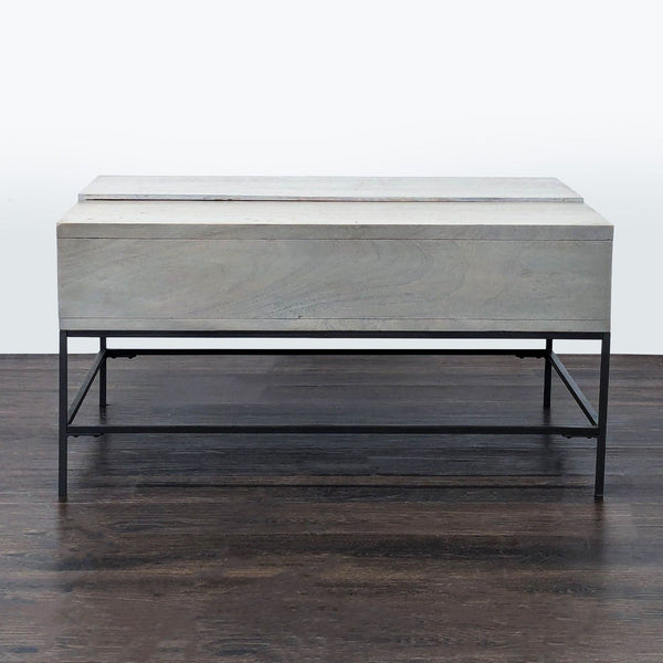 1. Modern West Elm coffee table with sleek lines, perfect for contemporary living spaces.  