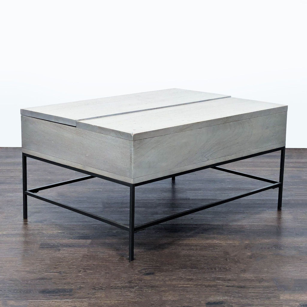 2. West Elm coffee table featuring minimalist design, suitable for stylish home decor.  