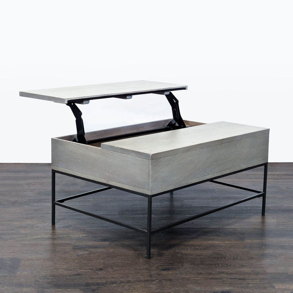 Industrial coffee table with pop-up top, grey wood finish, black metal base, and hidden storage compartment.