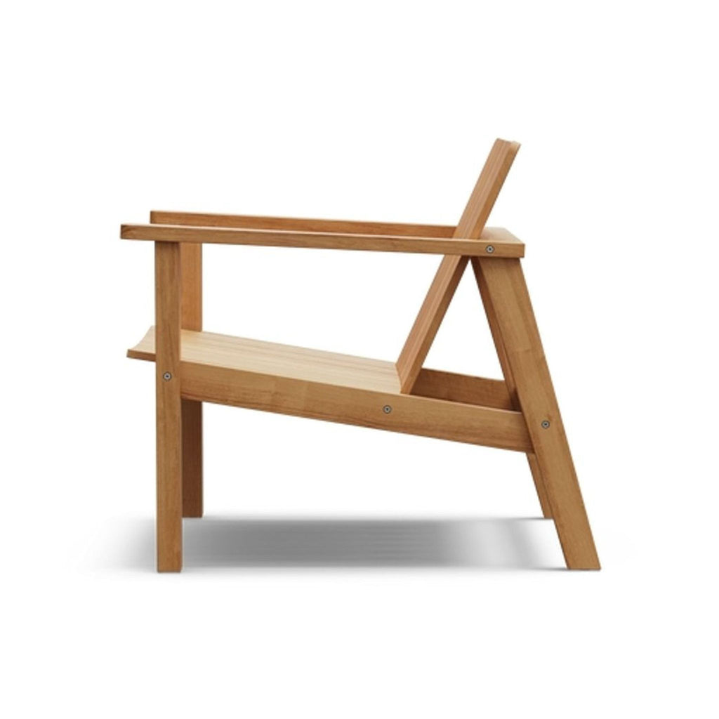Sturdy wooden chair by Neighbor with broad armrests and a sleek, supportive slatted structure for relaxing spaces.