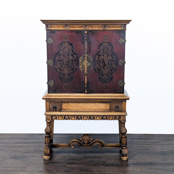 Early 20th century Berkey & Gay cabinet with painted floral doors, burled wood, and brass hardware.