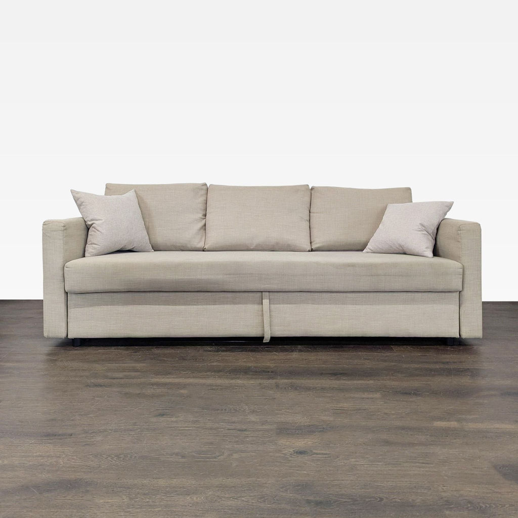 Beige Ikea sleeper sofa with clean, modern look, easily converting into a bed for guests or daily use.