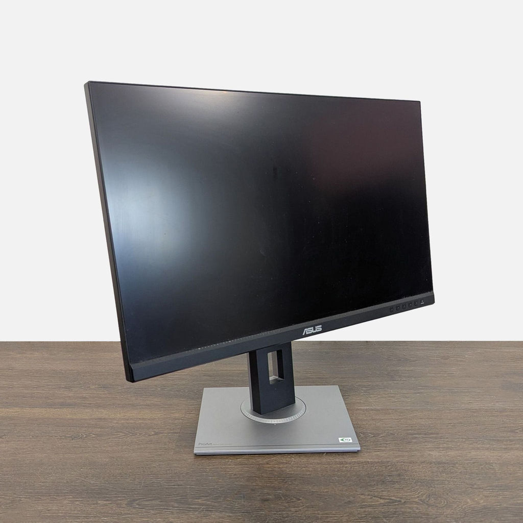 Side angle of Asus monitor on a desk, showcasing the thin profile and clear screen, suitable for office or home use.