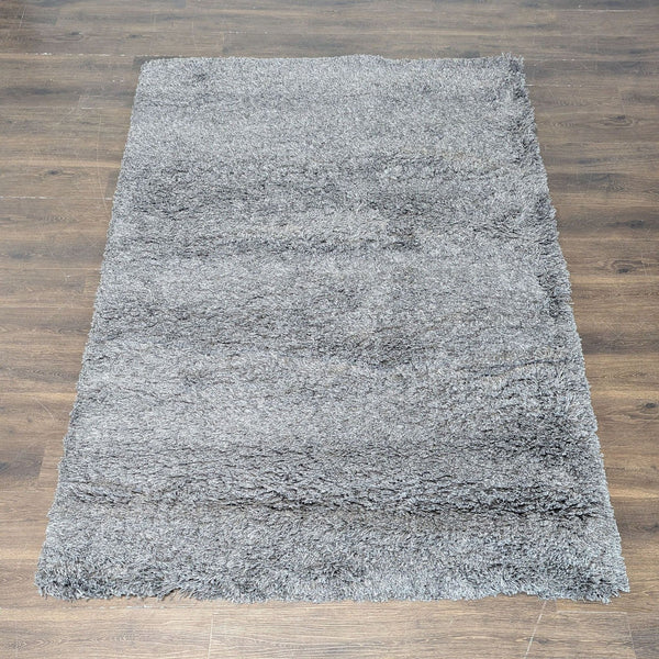 Gray IKEA GÅSER high-pile rug with plush shag texture, perfect for adding softness to modern interiors.
