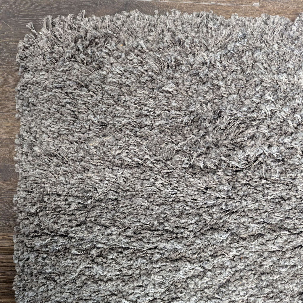Soft gray shag area rug from IKEA, featuring a thick, durable pile that complements Scandinavian-style rooms.