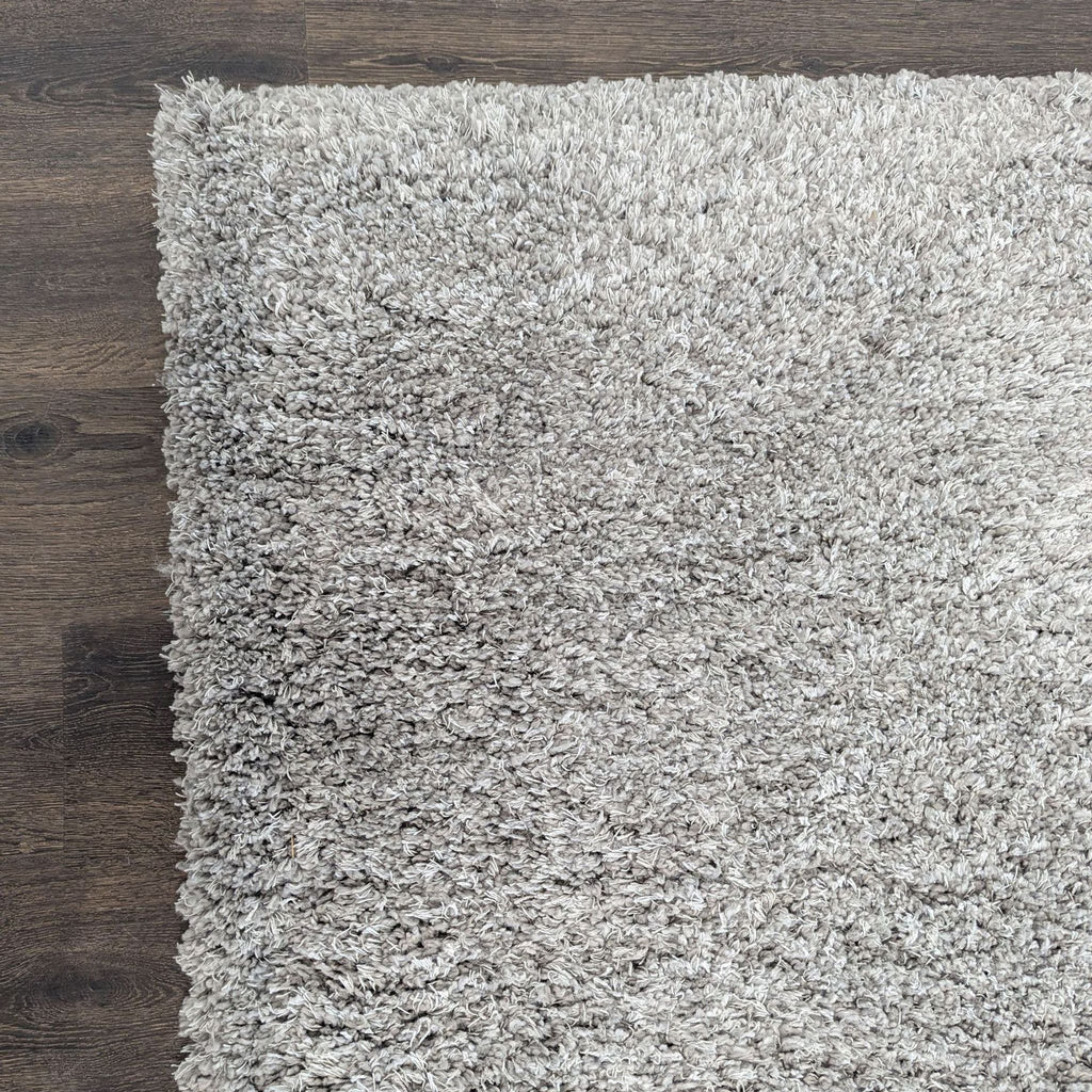 Plush gray shag rug that blends with most decor, offering warmth and style to your space.
