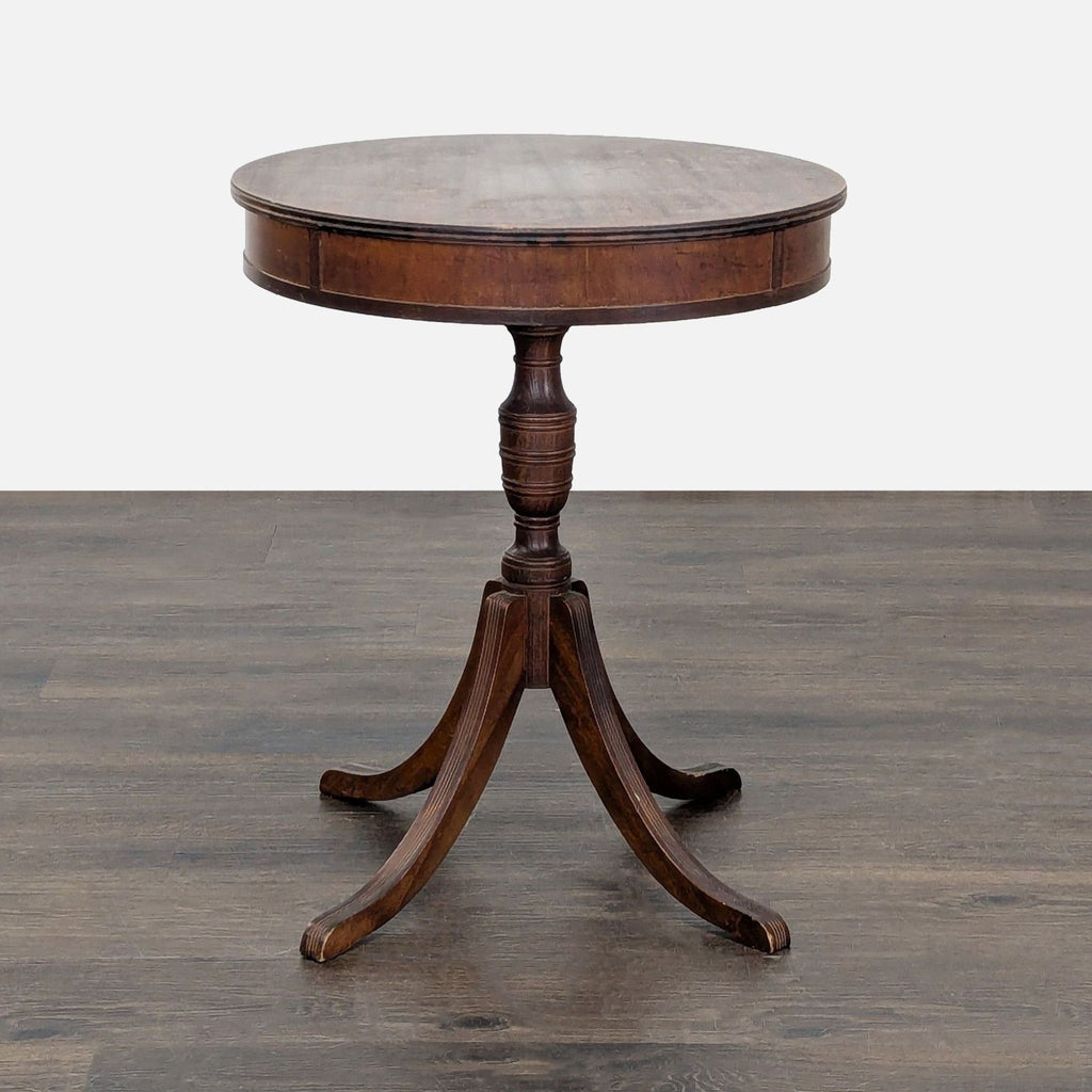 1. Barker Brothers Furniture end table featuring a classic wooden design with a single drawer and lower shelf.  