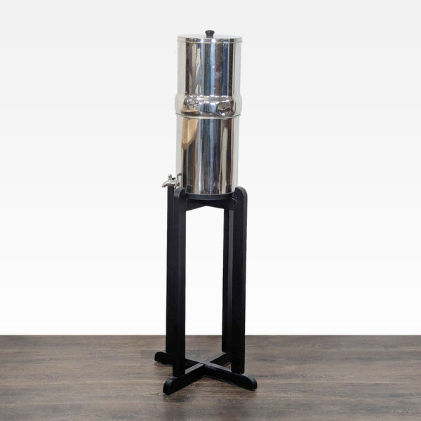 Stainless steel Berkey water purifier in excellent condition, suitable for home filtration.  