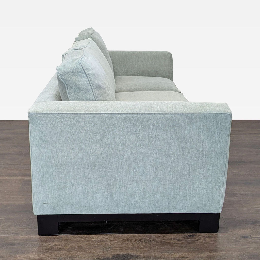 3. Elegant 3-seat sofa by Jonathan Louis, offering ample space and stylish design for modern home interiors.