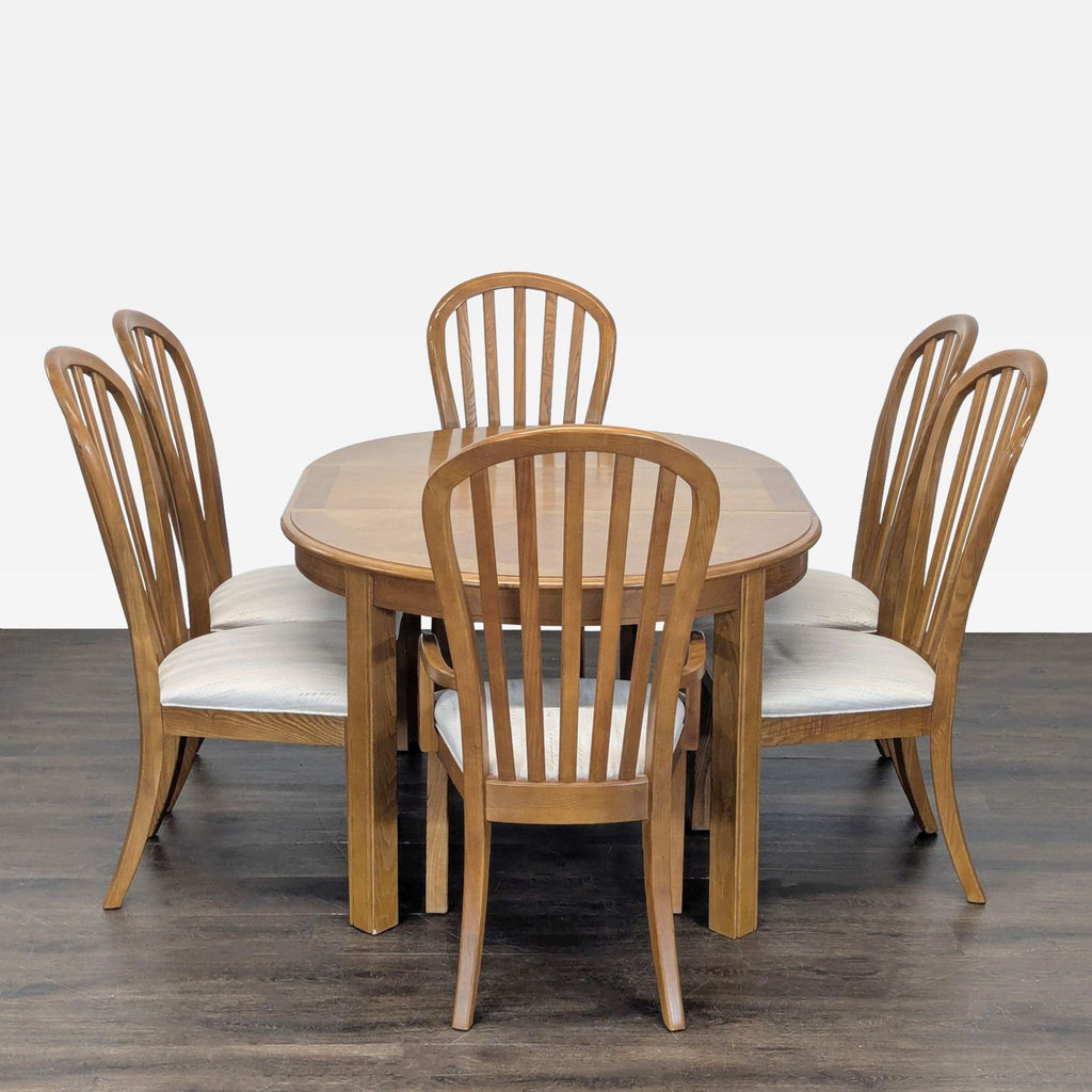 2. Modern Dining Set by Stanley Furniture, includes coordinating table and chairs for a cohesive dining space.  
