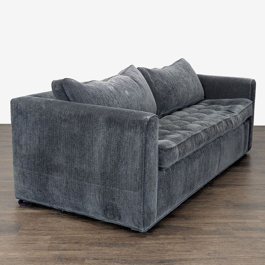 Modern dark gray pull-out sofa bed, perfect for living rooms, guest rooms, or apartments with limited space.