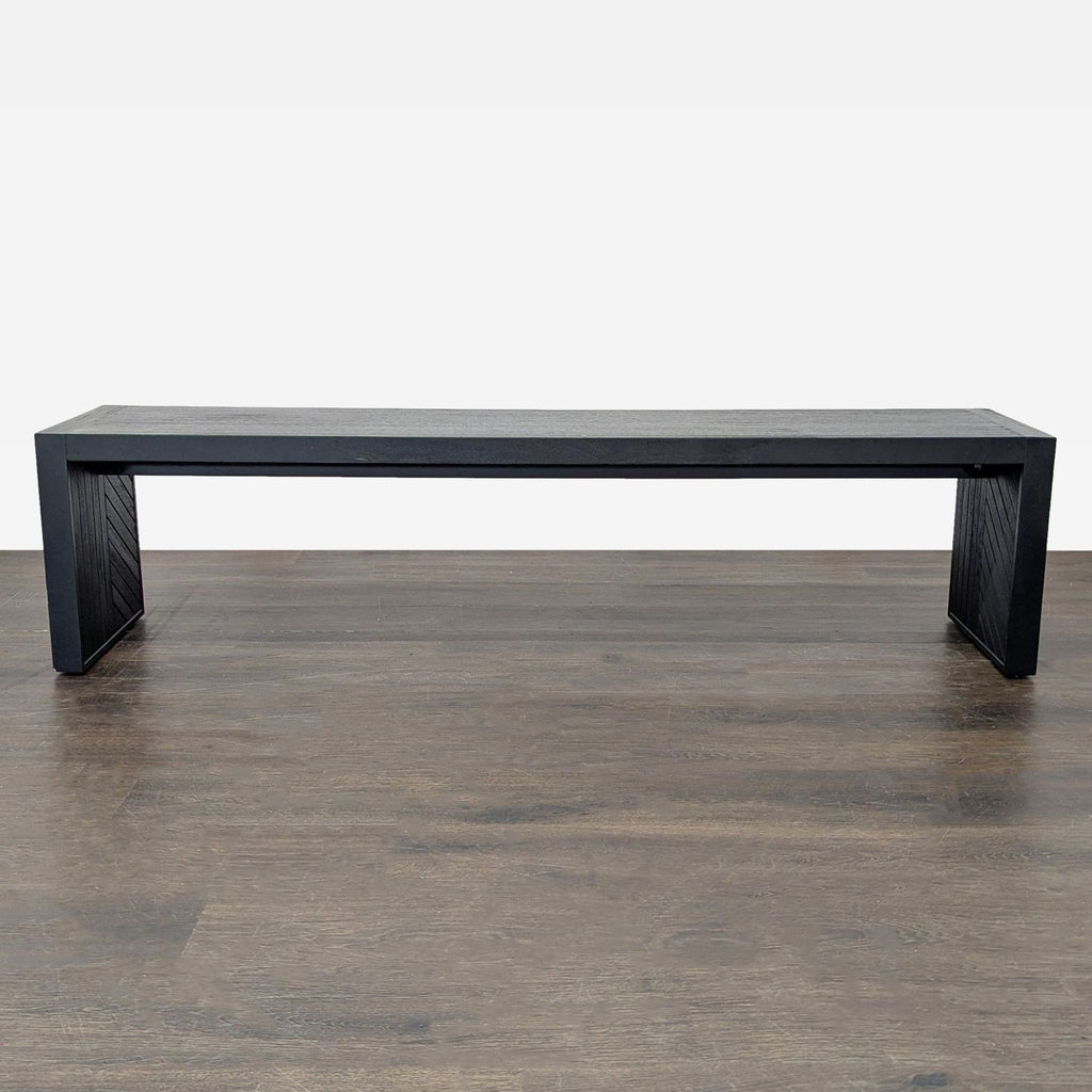 Modern dining bench made of hand-inlaid mango wood with geometric patterns and a rustic, ebonized finish.