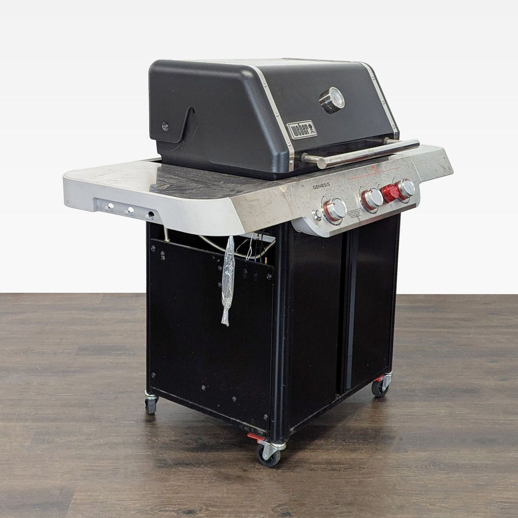 Used Weber gas grill featuring three burners, side shelves, storage below, and built-in temperature gauge.