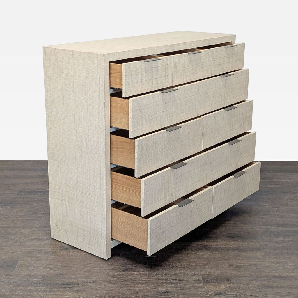 Modern light-finished dresser by Restoration Hardware featuring spacious drawers and simple metal handles.  