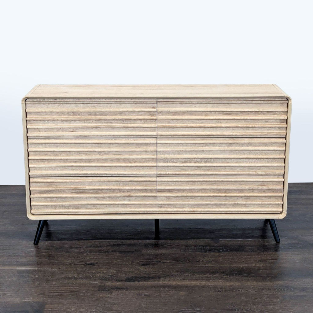 Certainly! However, it looks like you haven't included any images or a full description for the item. Please provide the images or describe the dresser so I can generate concise, accurate alt texts for you.