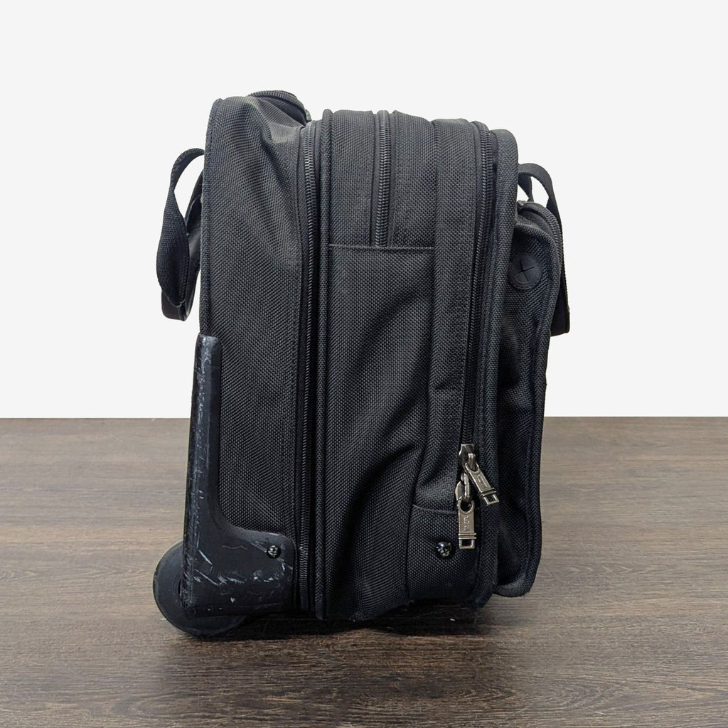 Tumi Black Rolling Carry-On Travel Bag with Telescopic Handle