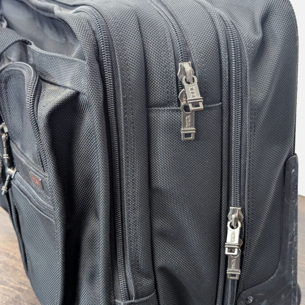 Tumi Black Rolling Carry-On Travel Bag with Telescopic Handle