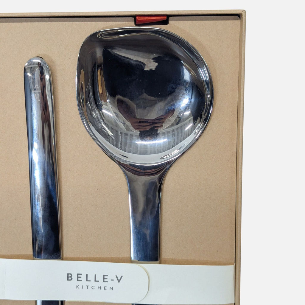 Set of Belle-V Kitchen serving spoons made of polished stainless steel in packaging.