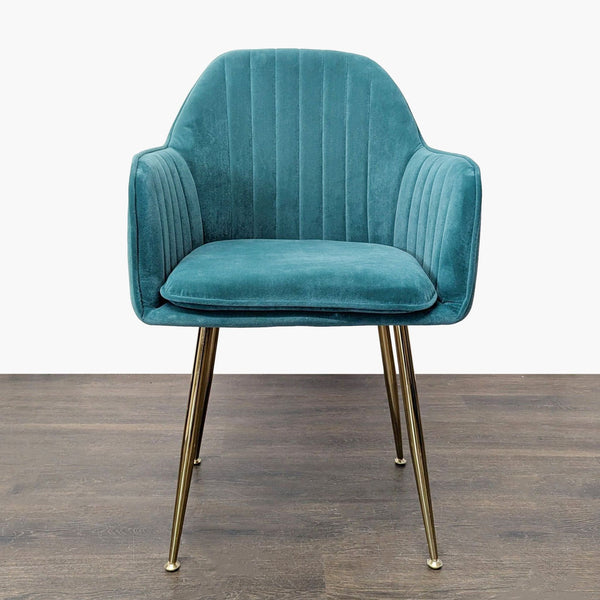 Teal velvet lounge chair with vertical stitching, padded armrests, and gold metal legs for a modern look.  