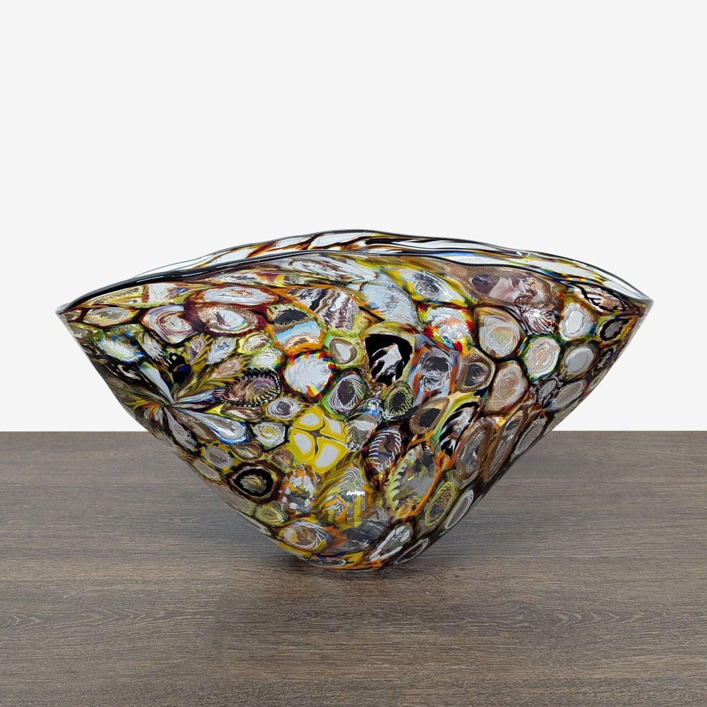 Hand-blown glass bowl with Millefiori flower patterns and rippled, handkerchief-like edges.