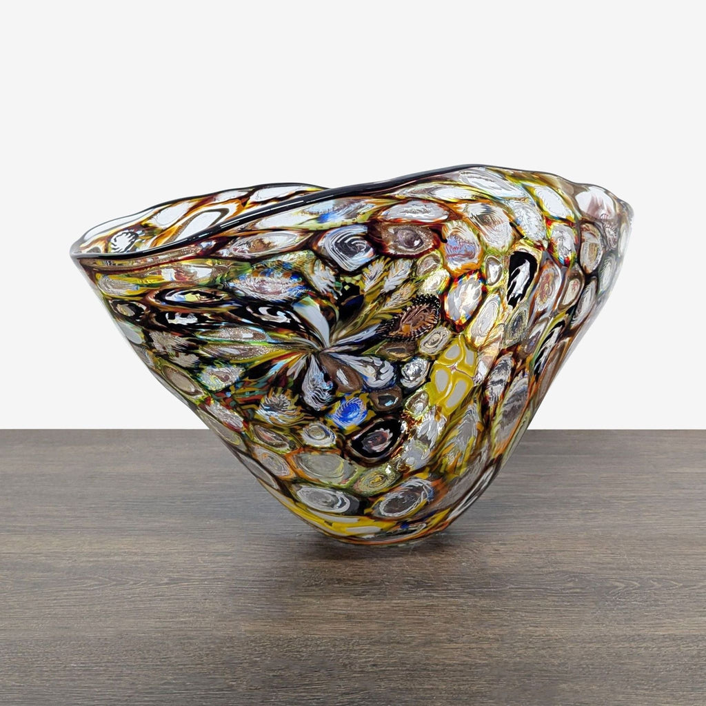 Decorative Millefiori Fazzoletto bowl, showcasing multicolored fused glass and undulating, fabric-like contours.