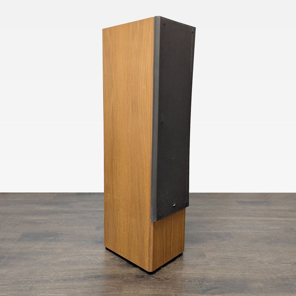 ADS stereo speakers with sturdy wood cabinets, standing side by side, suitable for home theater use.  
