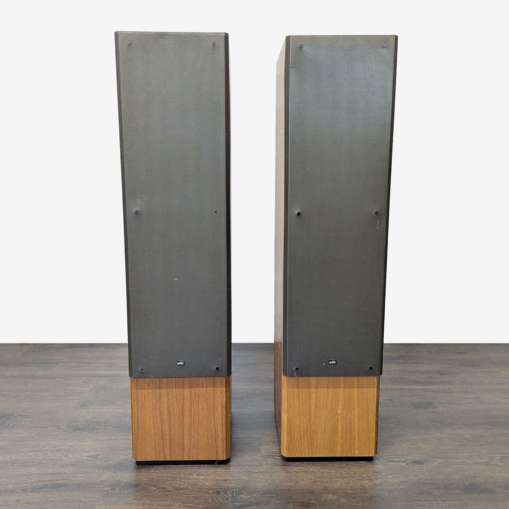Two ADS home speakers with classic design, wood exterior, built for powerful, clear music playback.
