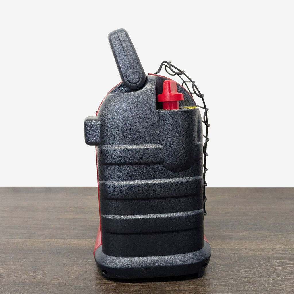 1. Compact red and black portable Mr. Heater unit designed for efficient room heating.