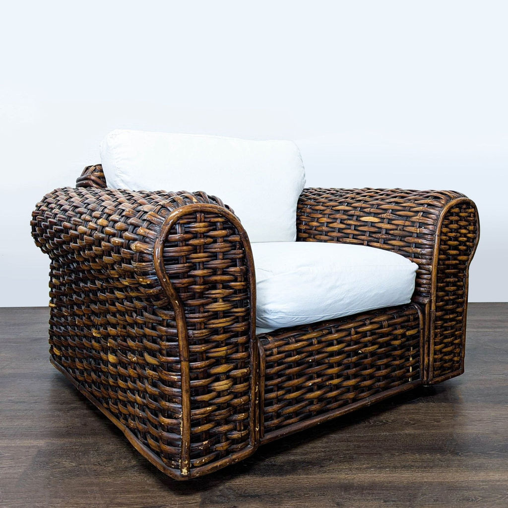 1. Modern lounge chair with plush cushions on a wooden frame, perfect for relaxing in living spaces.