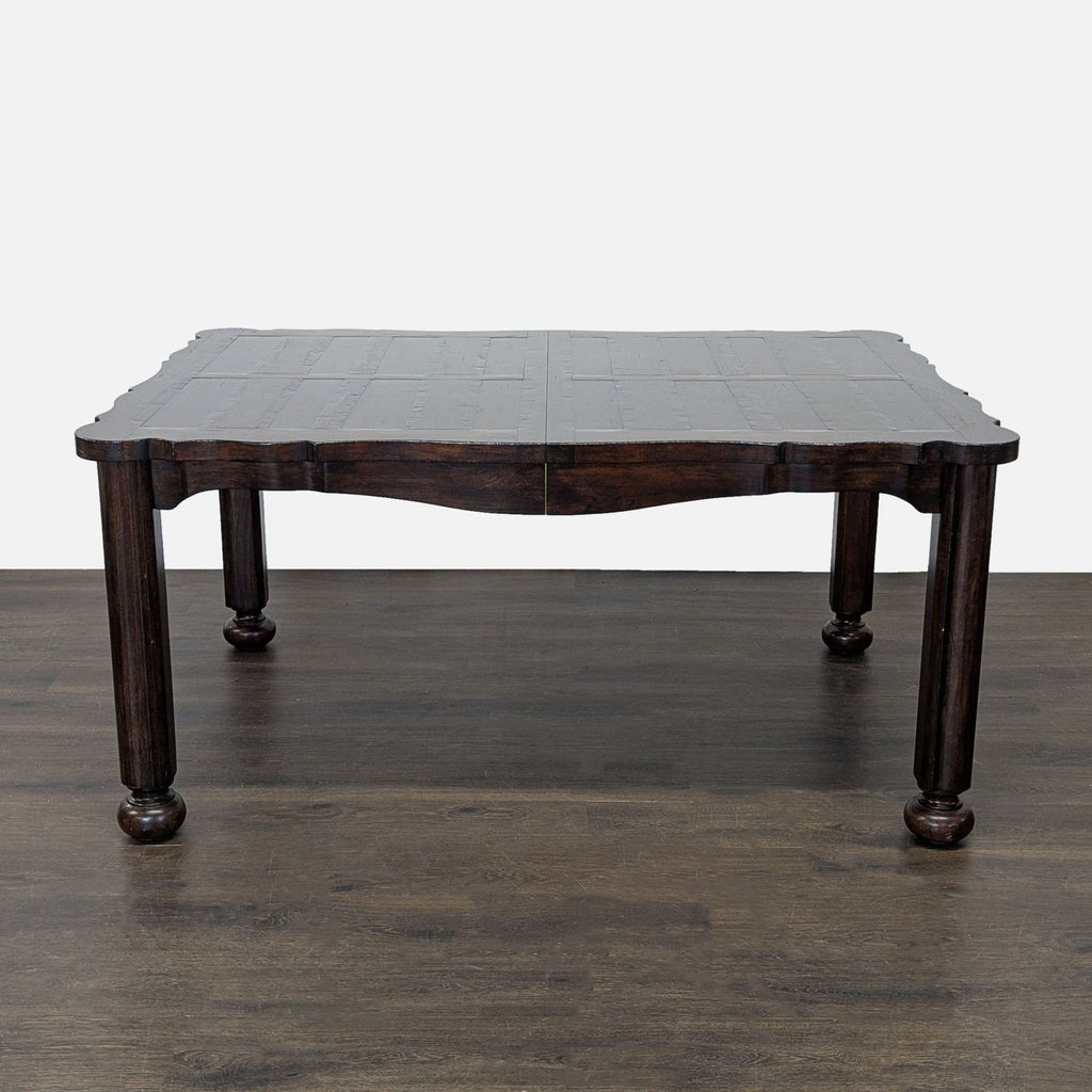 Rustic European farmhouse dining set by Stanley Furniture, showing parquet-top table and linen-upholstered side chairs.