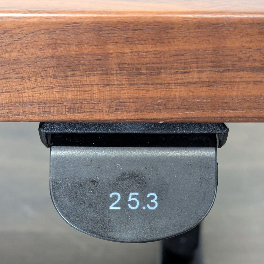 Uplift brand electric desk, 80” x 30” wood surface, adjustable frame, programmable controls, and spacious design.
