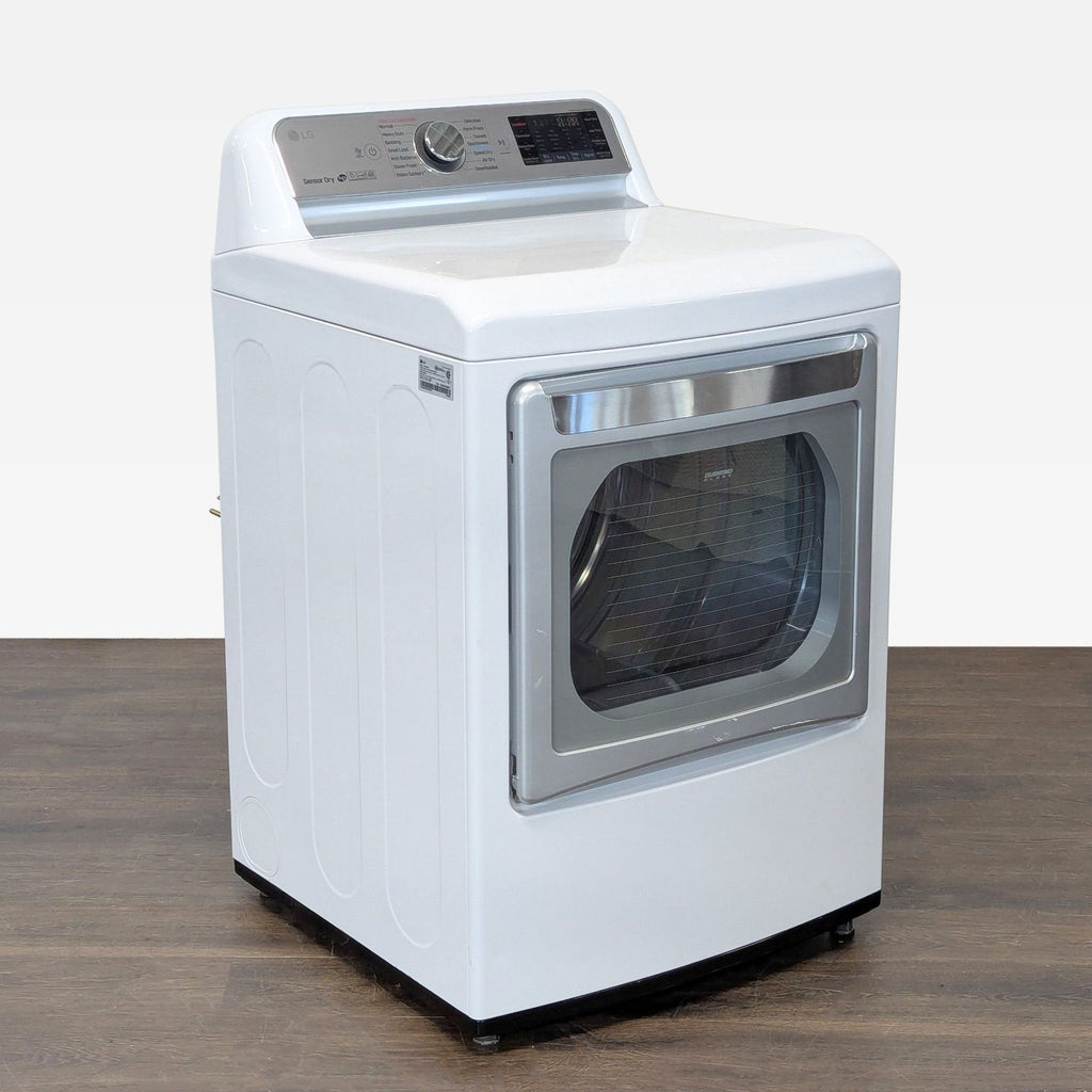 White LG dryer featuring a transparent door and intuitive controls, ideal for handling large laundry loads easily.  