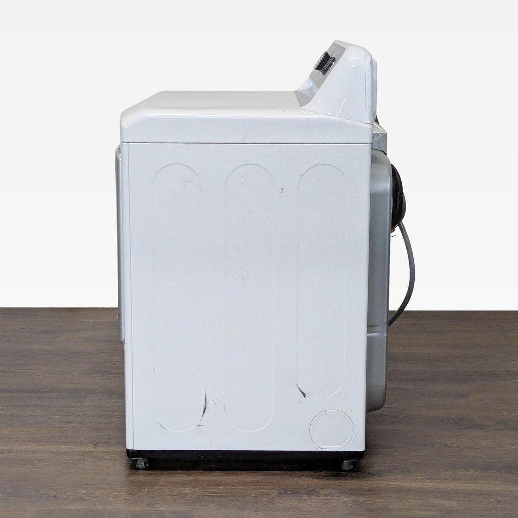 Spacious LG electric dryer, washer/dryer category, clear front door, sensor dry, modern design for home use.