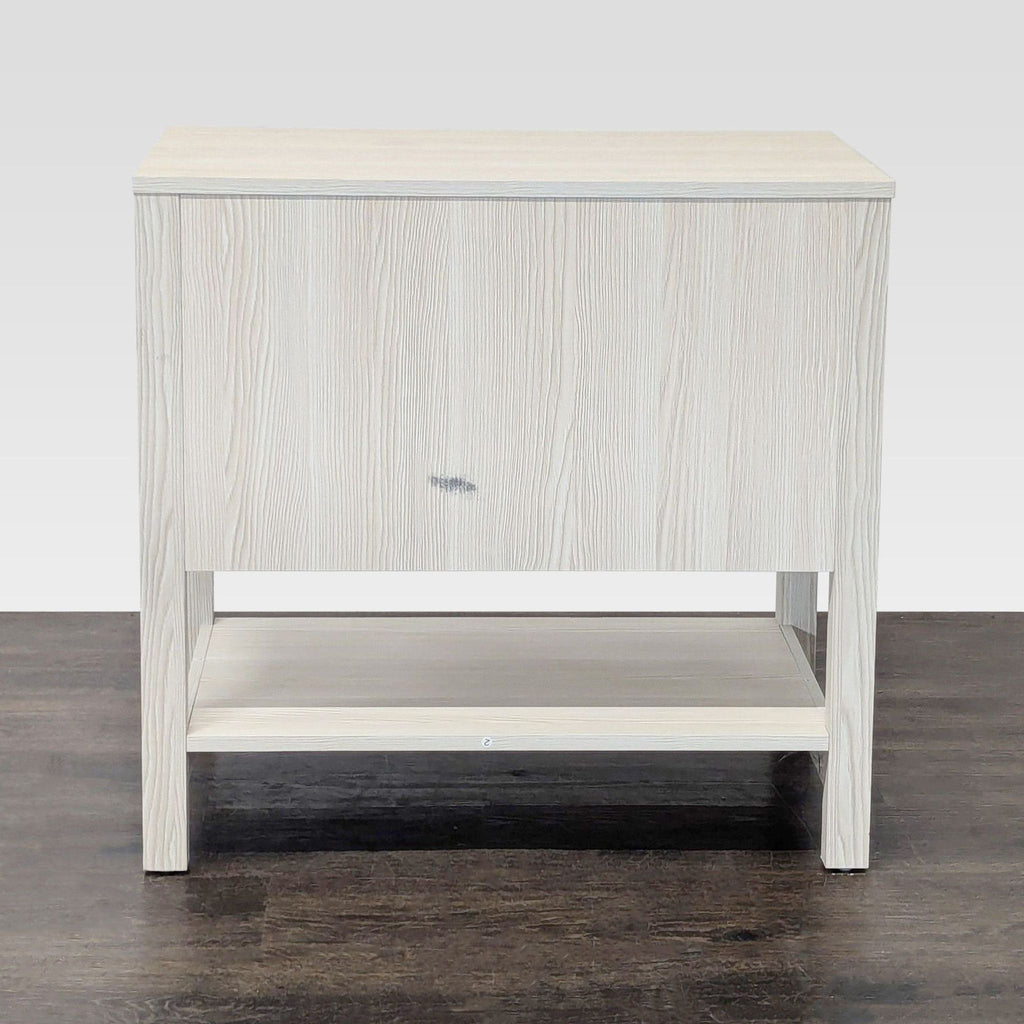 Breakwater Bay end table with woven rattan accents on drawers, blending style and texture.