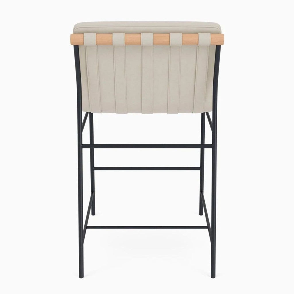 Chair featuring pearl leather upholstery, leather straps, an oak dowel, and a steel frame by Denver Modern.
